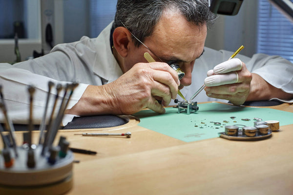 Watchmaker Servicing a watch