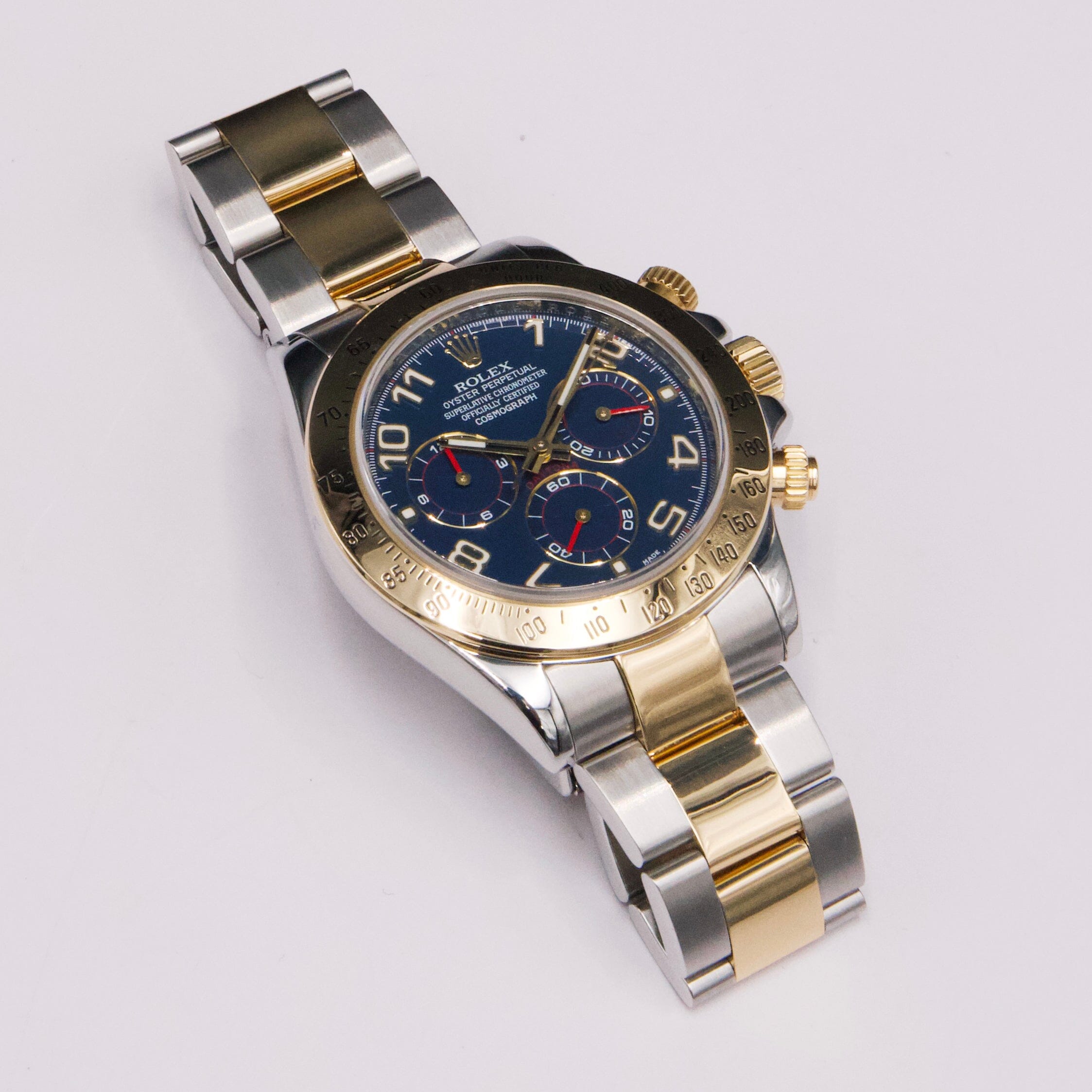 Rolex Daytona 116523 Blue Racing Dial Two-Tone Mens Watch | – Phigora