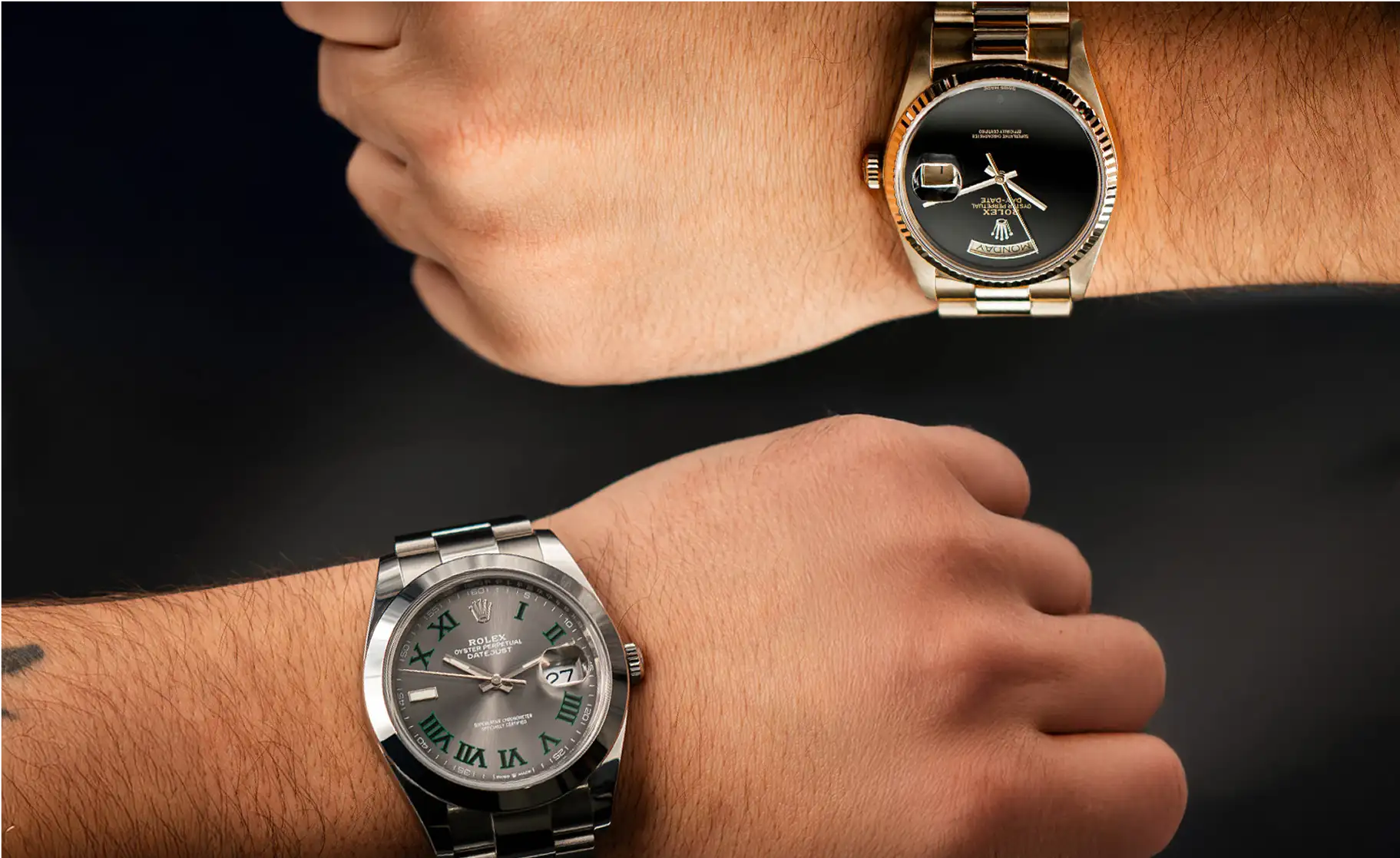 A sleek silver rolex day-date watch with a gray dial and roman numerals, featuring an elegant stainless steel bracelet.