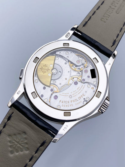 Patek Philippe World Time 5110G 18K White Gold Mens Watch With Archives - Watches